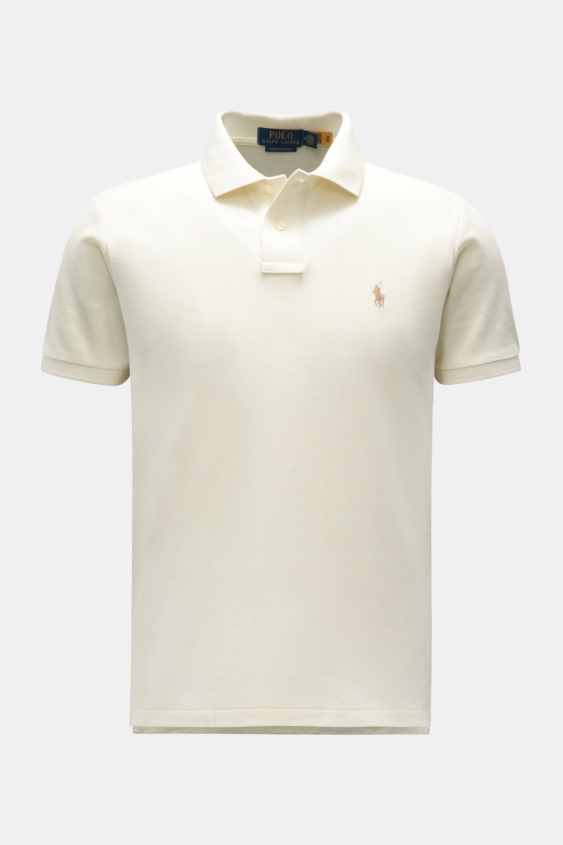 Front view of Polo Ralph Lauren Poloshirt creme, the classic piqué model made of pure cotton since 1972, featuring the iconic polo player stitching on the chest. <p>Seit 1972 der Klassiker unter den Poloshirts: Das ikonisches Piqué-Modell aus reiner Baumw