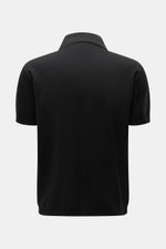 Rear view of the 04651/ A trip in a bag Poloshirt 'TP' schwarz, made of pure cotton piqué with a soft touch, regular fit, classic polo collar, smooth button placket, small woven label in side seam, and comfortable ribbed cuffs. <p>Ob im Urlaub oder Office