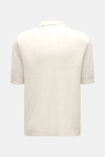 Rear view of 04651/ A trip in a bag Short sleeve knit polo 'Johnny' cream, showing its oversized fit, fine knit, and subtle striped pattern.

Description:  
<p>Modern classic: This short sleeve knit polo by 04651/ A TRIP IN A BAG has a clean striped look 