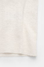 Close-up front view of 04651/ A trip in a bag Short sleeve knit polo 'Johnny' cream, showing its fine knit, subtle striped pattern, ribbed bands, and slightly robust linen-cotton blend.

<p>Modern classic: This short sleeve knit polo by 04651/ A TRIP IN A