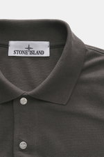 Stone Island Polo shirt 'Stellina' dark grey shown from above, piqué made of pure cotton, textured feel, garment dyed, slim fit, typical polo collar, two-button placket with snap fasteners, subtle Stellina stitching on the front.