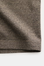 Close-up front view of the textured fabric of the Emporio Armani Jersey Polo Shirt Gray Brown Melange in regular fit with classic collar.

Description:
<p>Sporty casualness: The EMPORIO ARMANI polo shirt combines comfortable quality with casual jersey des