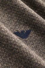Close-up front view of the Emporio Armani Jersey Polo Shirt Gray Brown Melange showing its lightly textured cotton and microfiber jersey with logo stitching.

Description: <p>Sporty casualness: The EMPORIO ARMANI polo shirt combines comfortable quality wi