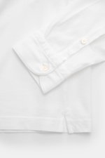 Gran Sasso Jersey Longsleeve-Poloshirt weiß, Detailansicht der Ärmelmanschette und seitlichem Saumschlitz, Baumwolljersey, Slim Fit, sportiv.