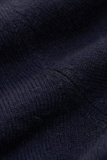 Close-up front view of the von Braun Cashmere knit polo navy, showing pure cashmere fine knit fabric with elasticated ribbed bands. Elegant basic for the cold season: This VON BRAUN knit polo is an elegant alternative to a jumper – made from pure cashmere
