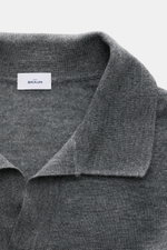 Close-up front view of von Braun Merino knit polo anthracite mottled showing open collar placket and fine knit texture. An elegant basic for casual looks: This VON BRAUN knit polo with open collar placket is a casual alternative to a fine knit jumper or s
