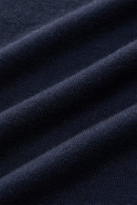 Close-up front view of navy blue von Braun Merino knit polo showing very fine pure merino wool knit fabric texture with soft feel. 

Additional description:
<p>An elegant basic for casual looks: This VON BRAUN knit polo with open collar placket is a casua