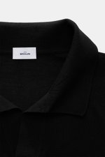 Close-up front view of von Braun Merino knit polo black showing signature polo collar and open collar placket.

<p>An elegant basic for casual looks: This VON BRAUN knit polo with open collar placket is a casual alternative to a fine knit jumper or shirt 