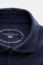 Close-up front view of the Fedeli Jersey Longsleeve Polo Shirt 'Zero' navy collar and placket, showing soft jersey fabric.

Description: <p>Soft and silky touch: pure Giza cotton – processed into comfortable jersey – makes the Longsleeve Polo Shirt 'Zero'