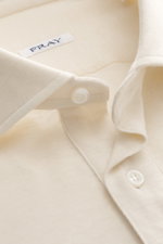 Close-up front view of Fray Jersey longsleeve polo shirt 'Parigi' cream showing classic polo collar, four-button placket, soft cotton and cashmere blend fabric, regular fit, and classic sport cuff.