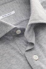 Close-up front perspective of Fray Jersey longsleeve polo shirt 'Parigi' grey melange showing classic polo collar, four-button placket, soft mix of cotton and cashmere fabric, regular fit, and classic sport cuff.