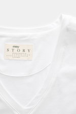 Close-up top view of the mey story V-neck T-shirt white showing the neckline and label on soft cotton and lyocell fabric.

Description: <p>Quality is at the forefront of the established label MEY STORY – and you can feel it with this clean V-neck T-shirt 
