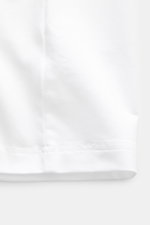 Close-up front view of the hem seam on a mey story V-neck T-shirt white, made from soft cotton and lyocell jersey fabric with comfortable stretch. Quality is at the forefront of the established label MEY STORY – and you can feel it with this clean V-neck 