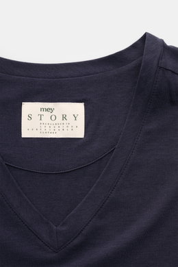 Close-up front view of the mey story V-neck T-shirt navy showing the neckline and brand label, made from a soft cotton and lyocell blend with stretch. Quality is at the forefront of the established label MEY STORY – and you can feel it with this clean V-n