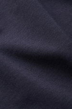 Close-up of the navy fabric of the mey story V-neck T-shirt navy showing its soft, smooth cotton and lyocell blend texture from a top-down perspective.

<p>Quality is at the forefront of the established label MEY STORY – and you can feel it with this clea