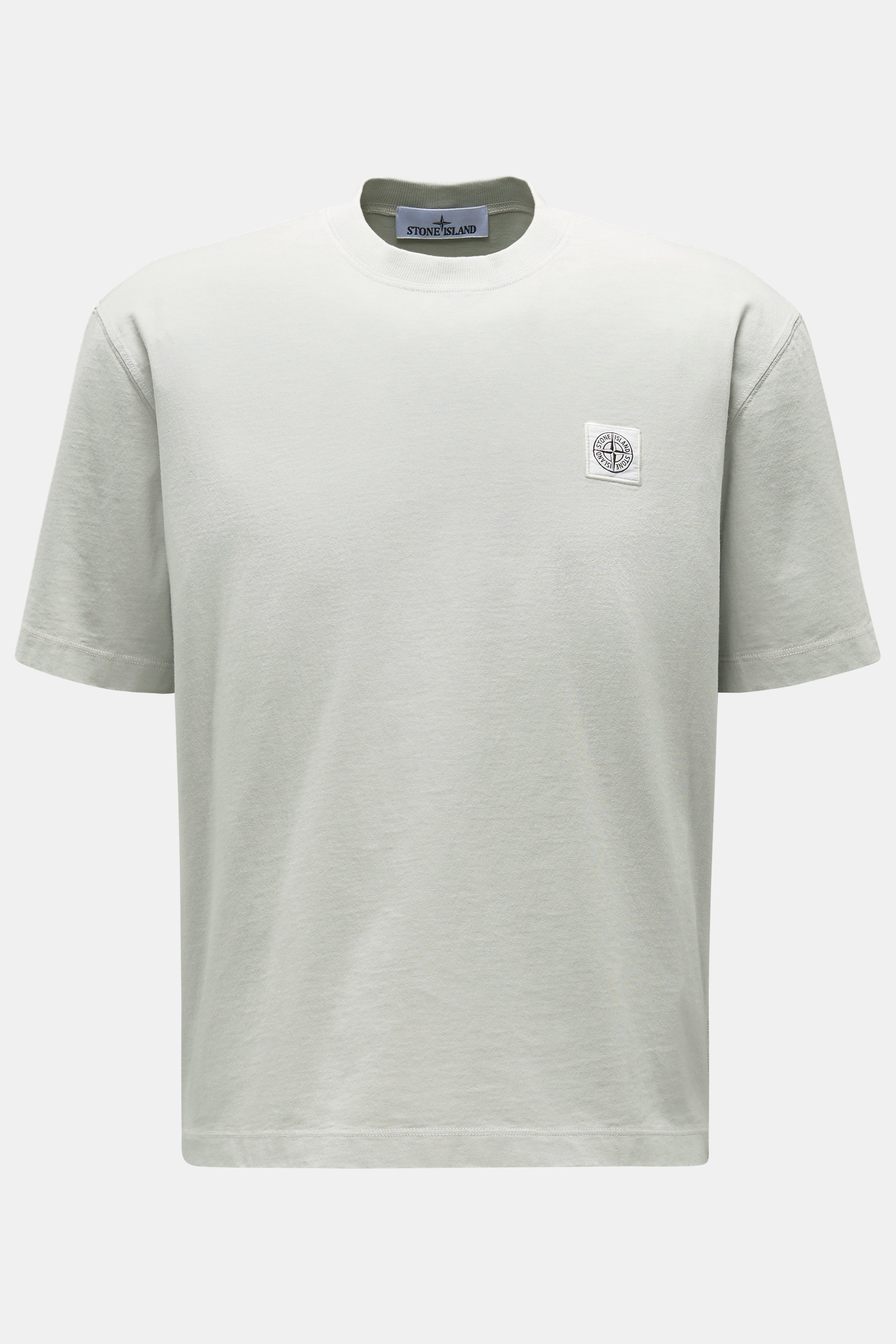 Stone Island Rundhals-T-Shirt hellgrau, kurz geschnitten, Regular Fit, aus garment dyed Baumwolle mit Kompass-Logo, frontal fotografiert.