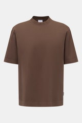 Front view of the 04651/ A trip in a bag Rundhals-T-Shirt 'Nunu Tee' braun, a brown oversized cotton jersey tee with a round neckline, soft feel, medium weight, and side seam web label. <p>Tauchen Sie ein in den relaxten Lifestyle von 04651/ A TRIP IN A B