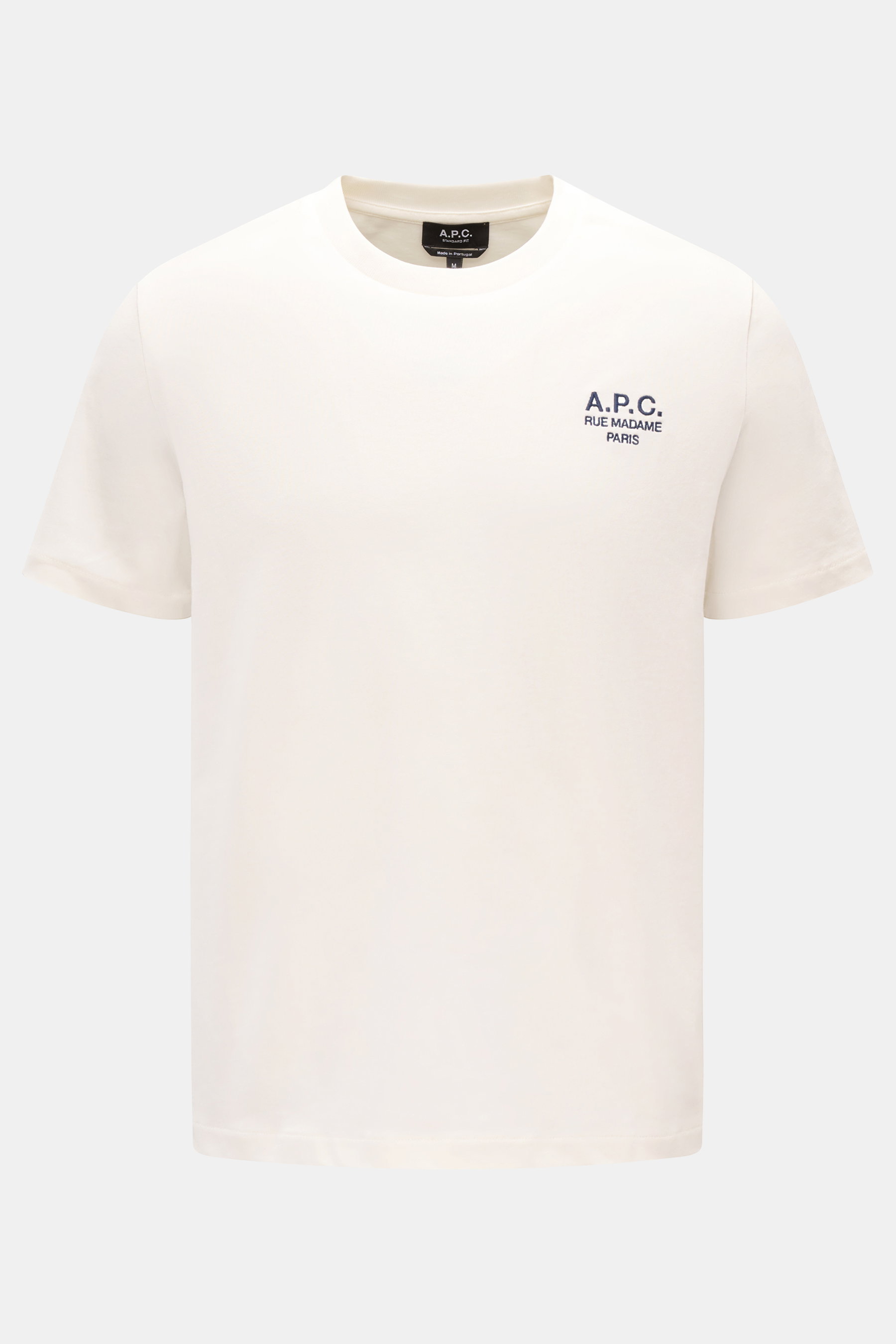 A front-facing view of the A.P.C. Crew neck T-shirt 'Standard Rue Madame' off-white in soft pure cotton jersey with regular fit, crew neck, and A.P.C. logo embroidery on the chest. 

<p>Clean, cool, A.P.C. – the T-shirt 'Standard Rue Madame' is the epitom