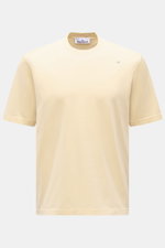 Stone Island Rundhals-T-Shirt 'Stellina' pastellgelb, frontal fotografiert, Slim Fit aus reiner Baumwolle mit weichem Griff, Rundhalsausschnitt, Overlock-Nähten und dezentem Stellina-Stitching auf der Brust.