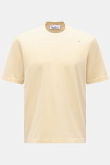 Stone Island Rundhals-T-Shirt 'Stellina' pastellgelb, frontal fotografiert, Slim Fit aus reiner Baumwolle mit weichem Griff, Rundhalsausschnitt, Overlock-Nähten und dezentem Stellina-Stitching auf der Brust.