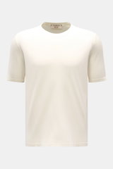 Front view of Fioroni Rundhals-T-Shirt offwhite, finely knitted from pure cotton with slim fit and short side slits.

<p>Für den gediegenen Auftritt im Frühling sorgt dieses fein gestrickte T-Shirt von FIORINI, welches aus reiner Baumwolle gefertigt wurde