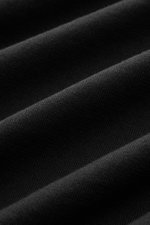 Close-up fabric detail of Fioroni Rundhals-T-Shirt schwarz showing fine knit texture from a side angle, pure cotton.

<p>Für den gediegenen Auftritt im Frühling sorgt dieses fein gestrickte T-Shirt von FIORINI, welches aus reiner Baumwolle gefertigt wurde
