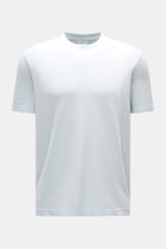 Front view of the 04651/ A trip in a bag Piqué T-shirt pastel blue, made of pure piqué cotton with a slim fit, crew neck, ribbed bands, and woven label in the side seam, offering a robust feel perfect for warm days.