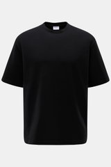 Frontansicht des schwarzen 04651/ A trip in a bag Rundhals-T-Shirts 'If Tee' aus elastischer Baumwolle, Oversized Fit, weicher Griff, Weblabel seitlich.