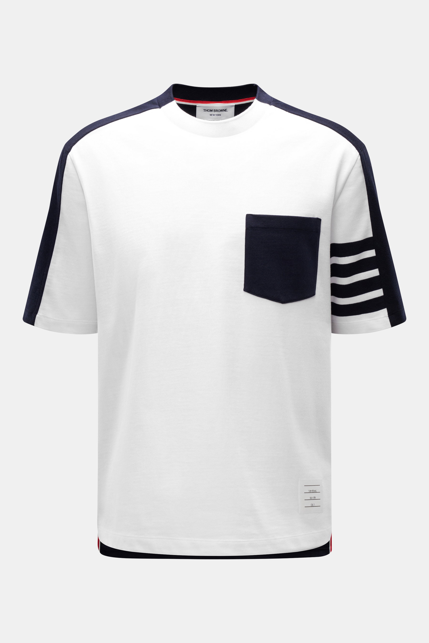Front view of Thom Browne T-shirt white/black, pure cotton, soft touch, slim fit, crew neckline, patch breast pocket, contrast color stripes on arm, short hem slits, extended back.