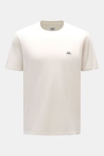 Front view of the C.P. Company Crew Neck T-Shirt offwhite, slim fit with pure cotton jersey, soft touch, crew neckline, and subtle logo patch on chest.