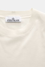 Close-up front view of Stone Island Crew neck T-Shirt 'Stellina' cream showing pure cotton jersey, slim fit, soft touch, and subtle Stellina stitching on chest.