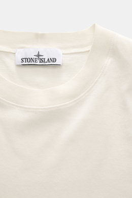Close-up front view of Stone Island Crew neck T-Shirt 'Stellina' cream showing pure cotton jersey, slim fit, soft touch, and subtle Stellina stitching on chest.