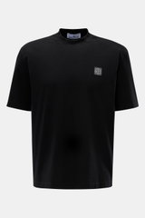 Stone Island Rundhals-T-Shirt 'Organic Cotton' schwarz, frontal fotografiert, aus reiner Bio-Baumwolle mit weichem Griff, Regular Fit, Rundhalsausschnitt und Weblabel auf der Brust.