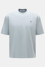 Front view of Stone Island Crew Neck T-Shirt 'Organic Cotton' smoky blue, showcasing pure organic cotton, soft feel, regular fit, crew neckline, and woven chest label.