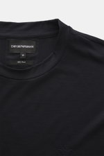 Emporio Armani Crew neck T-Shirt dark navy shown from a top front angle, made of pure wool, soft feel, slim fit, with logo stitching on the chest.