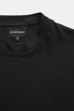 Emporio Armani Crew neck T-Shirt black shown from a close-up front angle, featuring pure wool, soft feel, slim fit, and logo stitching on the chest.