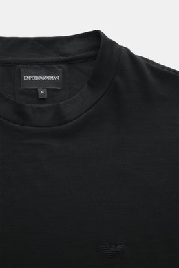 Emporio Armani Crew neck T-Shirt black shown from a close-up front angle, featuring pure wool, soft feel, slim fit, and logo stitching on the chest.