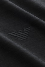 Close-up, angled view of the Emporio Armani Crew neck T-Shirt black showcasing pure wool fabric, soft feel, slim fit, and logo stitching on the chest.