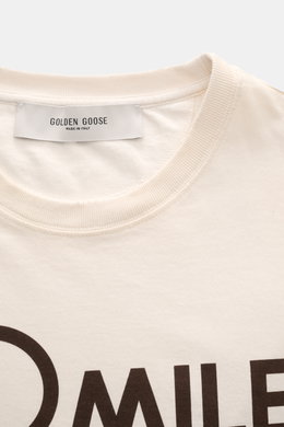 Golden Goose Crew Neck T-Shirt Cream shown from a close-up front perspective, featuring pure cotton, heavy quality, regular fit, crew neckline, and bold lettering on the front. 

A bold statement for warm days: The T-shirt by GOLDEN GOOSE stands out wit