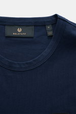 Close-up, top-front view of the Belstaff Crew neck T-shirt navy showing the crew neck and BELSTAFF woven label.

Description: Uncomplicated and authentic: This T-shirt in lightweight cotton jersey by BELSTAFF features clean lines and a subtle woven label.
