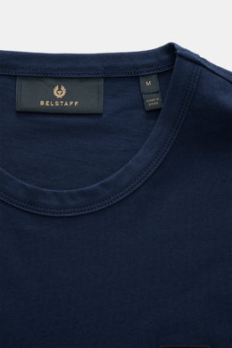 Close-up, top-front view of the Belstaff Crew neck T-shirt navy showing the crew neck and BELSTAFF woven label.

Description: Uncomplicated and authentic: This T-shirt in lightweight cotton jersey by BELSTAFF features clean lines and a subtle woven label.