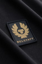 Close-up front view of the Belstaff Crew neck T-shirt black showing the subtle woven label on soft, lightweight pure cotton jersey fabric. Uncomplicated and authentic: This T-shirt in lightweight cotton jersey by BELSTAFF features clean lines and a subtle