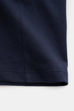 Close-up view of the Ami Paris Crew Neck T-Shirt Navy showing navy pure cotton jersey fabric with soft feel, slim fit, and detailed stitching.

Description: <p>Classic jersey basic from the French label AMI PARIS: This crew neck T-shirt is made from pur