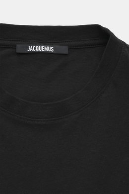 Close-up front top view of Jacquemus Crew neck T-Shirt black showing neckline and logo label, pure cotton, soft touch, slim fit, logo print on the front.