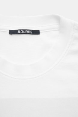Close-up front view of Jacquemus Crew neck T-Shirt white showing neckline and label, pure cotton, soft touch, slim fit, distinctive print on front.