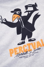 Close-up front view of the Percival T-Shirt grey melange featuring a playful black and orange bird graphic with "PERCIVAL" text in bold orange.

Description: Casual through the transitional period: The T-shirt from PERCIVAL sets a relaxed street style acc