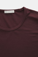 Close-up top-down view of Kiefermann Crew neck T-shirt 'Hero' burgundy, showing crew neck and label, featuring a blend of cotton and modal, elasticated fabric, soft touch, slim fit, and crew neck design.