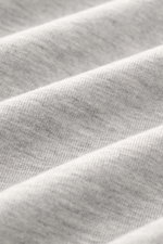 Close-up front view of fabric texture showing soft touch, elasticated jersey in modal and cotton of the Kiefermann Crew neck long sleeve 'Emil' grey melange, slim fit with crew neck.