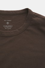 Close-up front top view of Officine Générale Crew Neck T-Shirt 'Cneck Tee' dark brown showing crew neckline and fabric texture. The soft feel of pure organic cotton makes the crew neck T-shirt 'Cneck Tee' from OFFICINE GÉNÉRALE a relaxed favorite – uncomp