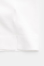 Close-up of the Filippo de Laurentiis Short sleeve jumper white, showing fine knit fabric and slim fit from a side perspective.  
Description: <p>A versatile basic: This short sleeve jumper by FILIPPO DE LAURENTIIS features a timeless design and incompara